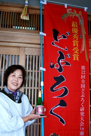 喜ぶ佐藤さん
